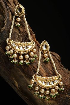 Product Features: Color: Green, Gold, White, Cream Material: Alloy Metal Design: Kundan, Pearls, Natural Stones, Faux Emerald Dimensions: Length of Earring= 7 CM; Width of Earring =4 CM; Adjustable - No Occasion: Festivewear, Partywear Product Type: Drop Earrings Disclaimer: There will be slight difference in digital to actual image Luxury Green Chandbali Bridal Earrings, Luxury Green Traditional Pearl Earrings, Luxury Green Elegant Jhumkas, Pearl Shop, Drop Earring, Gold Drop Earrings, Metal Design, Pearl Drop Earrings, Pearl Drop