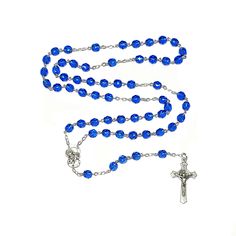 Rosary is handcrafted with Czech sapphire blue crystal glass beads on silver plated chain. AVE: (Hail Mary Beads): 7 mm, Czech sapphire blue crystal glass beadsPATER: (Our Father Beads): 7 mm, Czech sapphire blue crystal glass beads CRUCIFIX: flared, St. Benedict crucifix - approx. 1 1/2", Italian-madeCENTERPIECE: Silver tone Cherubs / Sacred Heart of JesusLENGTH: approx. 20 1/2 inches Also known as Dominican Rosary and Holy Rosary.The St. Benedict medal serves as protection against evil and tem Protection Against Evil, St Benedict Medal, Benedict Medal, Holy Rosary, Sacred Heart Of Jesus, St Benedict, Rosary Catholic, Heart Of Jesus, Hail Mary