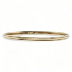 Condition: Good Material: Gold Style: Bangle Length: 7.5" Gold Purity: 14K Gold Weight: 14.10 grams Carat Weight: Stone: Clasp: This unique item is available for sale both online and in our retail store showcase. If you love it, complete your purchase now so you don’t miss out. Over a million visitors a year shop our retail store, and great finds sell fast! Condition: Good Everyday Flexible Round Gold Bracelet, Classic Stackable Bracelet Jewelry, Classic Gold Stackable Bracelet Gift, Classic Gold Stackable Bracelet For Gift, Classic Stackable Gold Bracelet Gift, Classic Stackable Gold Bracelet For Gift, Everyday Stackable Round Gold Bracelet, Classic Adjustable Hoop Bracelets, Dainty 14k Gold Stackable Bracelets