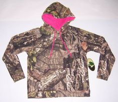 NEW WITH TAGS! MOSSY OAK WOMEN'S GREEN/BROWN CAMO W/ PINK HOODIE SWEATSHIRT SIZES: SMALL     MATERIAL: 70%COTTON / 30%POLYESTER *COLOR MAY LOOK SLIGHTLY DIFFERENT DUE TO LIGHTING* WE WILL COMBINE SHIPPING TO SAVE YOU MONEY ON MULTIPLE PURCHASES OUR SHIPPING PRICES ARE FOR SHIPPING & HANDLING..WE ALWAYS ADD A TRACKING NUMBER WHENEVER POSSIBLE SO BUYERS CAN TRACK THEIR PACKAGE. HANDLING CHARGES DO NOT SHOW ON THE SHIPPED PACKAGE OR EBAY PAGE. INTERNATIONAL BUYERS PLEASE UNDERSTAND THAT WE CAN'T CO Pink Sweatshirt For Outdoor Fall Activities, Pink Hoodie For Outdoor Fall Activities, Pink Long Sleeve Hoodie For Outdoor Activities, Camouflage Hoodie, Mossy Oak Camo, Camo Outfits, Camo Girl, Mossy Oak, Hoodie Girl