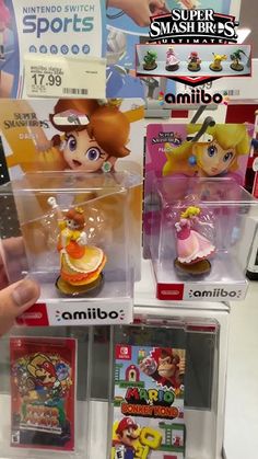 nintendo wii amiibo figures are on display for sale at a store in tokyo, japan