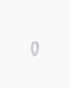 This diamond huggie earring is crafted from solid gold, making it a timeless and luxurious addition to any jewelry collection. Perfect for stacking or to wear alone, this diamond earring provides long-lasting shine. Wear yours stacked with other diamond huggie hoop earrings and studs. 14K White Gold Diamond Pavé Huggies Earring in 14k Solid White gold/Single, Women's by gorjana Formal White Gold Huggie Earrings With Single Diamond, Everyday White Gold Diamond Cartilage Earrings, White Gold Huggie Diamond Earrings With Single Diamond, Diamond Huggie Cartilage Earrings Fine Jewelry, Diamond White Diamond Huggie Single Earring, Classic Diamond White Single Huggie Earring, Small Hoop White Gold Diamond Rings, Minimalist Brilliant Cut Diamond Huggie Earrings, Diamond Small Hoop Single Cartilage Earring