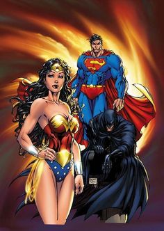 superman and wonder woman standing next to each other