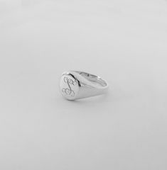 "925 Sterling Silver Baby Signet Ring. It's cutest personalized gift for babies. This small baby ring can be a great gift for 1, 2,3, 4 5 years old. Free monogramming made of : 925 Sterling Silver Ring Size Available: Size Finger Perimeter (mm, inch) US# 0.5 39mm/1.60 inch US# 1.5 42mm/1.65 inch US# 2.5 47mm/1.75 inch US# 3.5 51mm/2.00 inch US# 4.5 55mm/2.3 inch (All size & measurements are approximate.. , we recommend that a tiny bigger is better, comfort than exact finger size, babies are Personalized Sterling Silver Engraved Ring For Gift, White Gold Engraved Name Ring For Gift, White Gold Engraved Name Ring As Gift, Engraved Name White Gold Ring For Gift, Minimalist Sterling Silver Monogram Engraved Ring, Minimalist Silver Engraved Ring With Monogram, Sterling Silver Initial Ring As Gift, Personalized White Gold Signet Ring For Promise, Personalized White Gold Signet Promise Ring