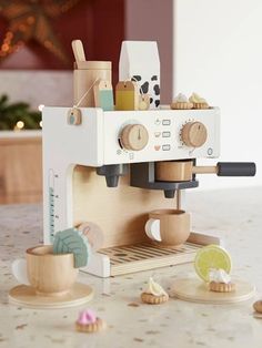 an espresso machine sitting on top of a counter