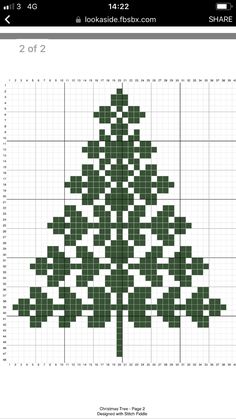 a cross - stitch christmas tree is shown on the app store's iphone screen