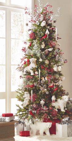 a christmas tree decorated with red and white ornaments