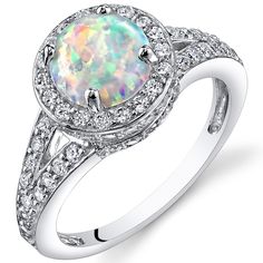 Peora.com - Opal Halo Ring Sterling Silver 1.25 Cts Sizes 5 to 9 SR11168, $39.99 (http://www.peora.com/opal-halo-ring-sterling-silver-1-25-cts-sizes-5-to-9-sr11168/) Silver Halo Ring, Sterling Silver Opal Ring, Vintage Halo, Silver Opal Ring, White Opal Ring, Fire Opal Ring, Gem Stones, Fine Jewels, Opal Ring