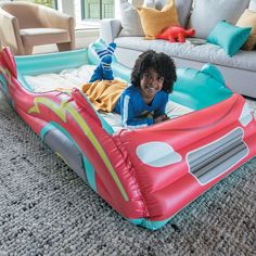 Transform Your Child's Room into a Thrilling Racetrack! Our unique Inflatable Racecar Bed Air Mattress is the perfect gift for any little driver. With its vibrant design and exciting features, it's sure to elevate your child's bedtime routine.

Soft and Comfortable: The flocked material provides a soft and cozy feel, while the two-piece design allows you to easily add a standard twin sheet to the mattress insert.Spacious and Versatile: Measuring 8 feet long x 36" wide x 20" tall, this bed is spacious enough for two children and can be used for sleepovers, movie nights, overnight trips, and pretend play.Includes: Inflatable racecar base measuring 72" long x 36" wide x 20" tall, twin-sized inflatable mattress, inflatable steering wheel, hand pump, and storage bag Kids Bedtime Routine, Kids Bedtime, Inflatable Mattress, Air Mattress, Twin Sheets, Hand Pump, Movie Nights, Bedtime Routine, Second Child