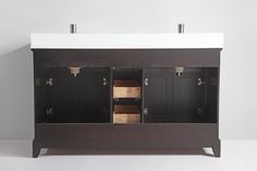 a bathroom vanity with two sinks and several cabinets on the wall behind it, in front of a white background