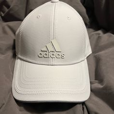 New With Tag, White Adidas Ball Cap. For Men Or Women One Size Fits Most. White Adidas Sporty Baseball Cap, Adidas White Curved Brim Hat, Adjustable White Adidas Hat, Adidas Casual Flat Bill Hat, White Snapback Hat For Sports In Spring, White Snapback Hat For Spring Sports, Adidas Visor Hat For Spring, White Casual Golf Hat, Casual White Trucker Hat For Golf