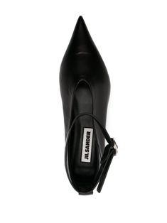 pointed-toe leather ballerina shoes from JIL SANDER featuring black, calf leather, branded insole, pointed toe, slip-on style, buckle-fastening ankle strap and flat sole. Size Info IT Color Detail Black Made In Italy Material Outer: Calf Leather 100% Lining: Calf Leather 100% Sole: Calf Leather 100% Season One Fall-Winter Season Two Fall-Winter Product flat shoes Brand Jil Sander Size And Fit Heel 0,6 in / 1,5 cm; Platform 0,4 in / 1 cm Pointed Toe Calf Leather Heels With Buckle, Pointed Toe Calf Leather Heels With Buckle Closure, Pointed Toe Calf Leather Slingback Pumps With Buckle Closure, Leather Pointed Toe Flats With Buckle For Work, Leather Mary Jane Court Shoes With Pointed Toe, Leather Ankle Strap Pointed Toe Flats For Work, Leather Pointed Toe Flats With Buckle For Office, Leather Pointed Toe Flats With Heel Strap For Office, Leather Pointed Toe Flats With Buckle Closure For Office