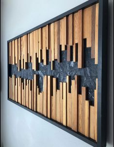 a wooden wall hanging with metal crosses on it