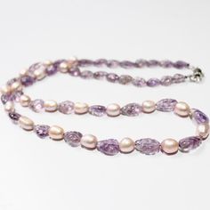 Stone :  Natural pearl/amethyst carved carving pear shape Beads necklace, Size: 7x6--12x8 mm Type: Natural Gemstone : Pearl / Amethyst Length : 20 inch  Color: Purple  Quality: AAA MOQ: 1 strands Delivery Time: 7 to 15 days Certification:: We can provide certificate of our company with every Product on customer request. Package: White cotton, bubble rapper, plastic boxes, as per your request. Great Quality : For making jewelry we have more stock same quality and quality in stock at price , pleas Elegant Purple Faceted Beads Gemstones, Classic Purple Round Bead Jewelry, Purple Oval Beaded Necklaces For Jewelry Making, Purple Oval Faceted Bead Necklaces, Purple Necklaces With Faceted Oval Beads, Purple Amethyst Faceted Beads Gemstones, Purple Oval Beaded Necklace, Elegant Oval Natural Gemstones, Purple Rondelle Gemstone Beads