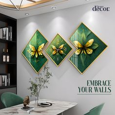 three clocks on the wall above a dining room table with green chairs and a vase