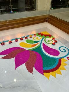 a decorated floor with candles on it