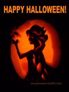 a carved pumpkin with the words happy halloween written on it and an image of a woman holding