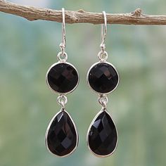 these mesmerizing dangle earrings presented by Alok Jain of India feature the magical charm of onyx shining through. A teardrop faceted black onyx gemstone is suspended by a second faceted round onyx stone. The sterling silver hooks and settings come in a high polish finish that complements the earrings' magical feel. Silver Threader Earrings, Lapis Jewelry, Single Stone Ring, Rose Quartz Bracelet, Hot Jewelry, Onyx Earrings, Onyx Gemstone, Dragon Pendant, Glass Beaded Bracelets