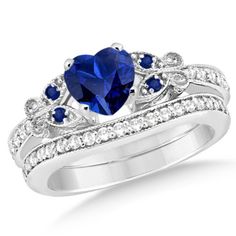 a heart shaped blue sapphire and diamond ring set