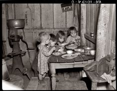 December 1936: "Christmas dinner in home of Earl Pauley near Smithfield, Iowa. Dinner consisted of potatoes, cabbage and pie." Another photo above with their father Haunting Photos, Rare Historical Photos, The Great, Old Photographs, Us History, Martin Luther, The Good Old Days