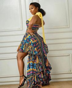 This beautifully made African print dress will make you look stunning and standout in that your forthcoming occasion. ABOUT SIZING: *  Comes in different sizes.  * For more perfect fit, please use the measurement guide/sample to measure and send us the following: @Bust @Waist @Hip  @Dress length  Kindly let us know how tall you are to enable us determine a perfect dress length for you. ORDERING PROCESS: * Please swipe left of the product/outfit picture to see pictures of available fabrics in num Yellow Printed Maxi Dress For Party, Multicolor Ruffled Dresses For Casual Occasions, Multicolor Fitted Sleeveless Gown, Multicolor Long Ruffled Dress, Fitted Multicolor Ruffled Maxi Dress, Ankara High Low Dress, African Birthday Dress, Showstopper Dress, Unique Ankara Styles