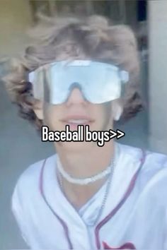 a woman wearing goggles with the words baseball boys in front of her face and behind her