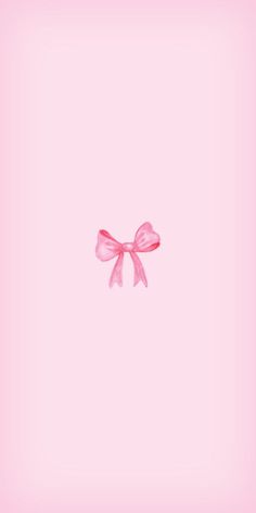 a pink bow on a pink background