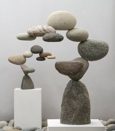 some rocks are stacked on top of each other