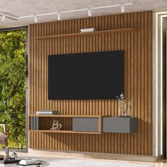 a living room with a large flat screen tv mounted to the side of a wall