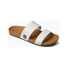 Enjoy a fun day under the sun in these Cushion Vista sandals from REEF. Designed with subtle yet striking New York Yankees details, these slides are perfect for poolside fun or game day festivities. The contoured footbed maximizes comfort, helping you feel your best as you rep the New York Yankees.Enjoy a fun day under the sun in these Cushion Vista sandals from REEF. Designed with subtle yet striking New York Yankees details, these slides are perfect for poolside fun or game day festivities. Th Adjustable Sport Sandals For Summer, Synthetic Slide Sandals For Summer, Sporty Synthetic Sandals For Summer, White Sandals For Beach Season, Casual Beach Slides In Synthetic, Adjustable Summer Sport Sandals, Sporty Slides For Swimming In Summer, Synthetic Slide Flip Flops For Summer, Casual Summer Slides With Synthetic Material