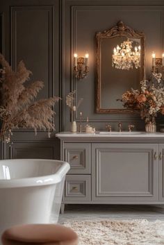 a bath room with a tub a sink and a mirror on the wall above it