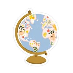 a sticker with flowers on it that is sitting on top of a globe,