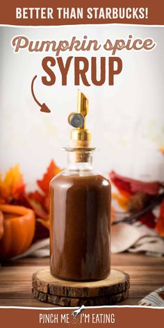 pumpkin spice syrup in a glass jar with the words, better than starbuckss pumpkin spice syrup