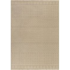 a beige rug with an intricate design on the front and back side, in two different colors