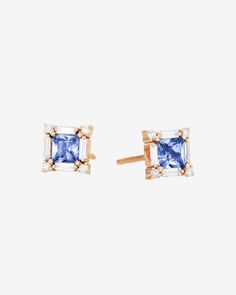 These elegant studs feature two 4x4mm princess cut light blue sapphire center stones, surrounded by white diamonds. They make a stunning addition to any wardrobe. Details 18k yellow gold, rose gold or white gold 0.80 carats of 4x4mm princess cut light blue sapphires 0.16 carats of baguette diamonds 0.08 carats of round white diamonds 7x7mm dimensions Ref: BAE736 Luxury Blue Baguette Cut Earrings, Blue Baguette Diamond Earrings Fine Jewelry, Light Blue Sapphire, Blue Sapphire Studs, Sapphire Studs, Baguette Diamonds, Stunning Earrings, Baguette Diamond, White Diamonds