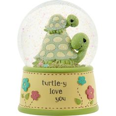 a turtle in a snow globe with the words turtle - y love you