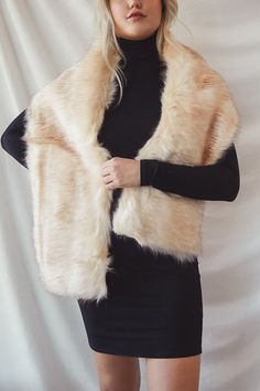 Trade in your winter scarf for a luxe new upgrade like the Never-Ending Elegance Ivory Faux Fur Stole! Ultra plush ivory and brown faux fur (with a satin reverse) shapes this slightly oversized stole, that loops to wear snug around the neck. Stole measures 34" long and 9" wide. Acrylic & Polyester mix. Imported. Lulus | Never-Ending Elegance Ivory Faux Fur Stole. Fur Stole Outfit, Fur Scarf Outfit, Dressy Jeans, Broadway Show, Faux Fur Stole, Faux Fur Wrap, Faux Fur Scarves, Scarf Outfit, Fur Shawl