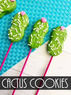 green cactus cookies on sticks with white sprinkles