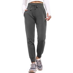 Stay warm and protected from the elements with our Women's Fleece Lined Pants. These water-resistant thermal joggers are perfect for winter running, hiking, and even just lounging around at home. The fleece lining will keep you cozy and comfortable, while the water-resistant material will keep you dry in light rain or snow. The pockets are perfect for storing your phone, keys, or other essentials while you're on the go. These sweatpants are perfect for any outdoor activity and are sure to become Winter Jogging Joggers With Elastic Waistband, Sporty Solid Cargo Pants For Winter, Sportswear Sweatpants With Side Pockets For Outdoor Activities, Sporty Cargo Pants For Winter, Winter Outdoor Joggers With Pockets, Winter Jogging Pants With Drawstring, Comfortable Fit Sweatpants With Pockets For Jogging, Relaxed Fit Joggers For Outdoor Activities, Relaxed Fit Sportswear Joggers For Outdoor Activities