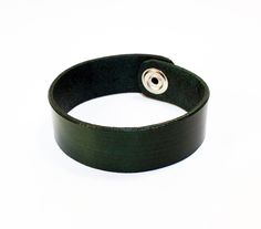 Handmade Green Leather Bracelet. Great gift! Very comfortable & easy to wear. Color: green. Material: leather. Probably about 2 centimeters wide. If you have any questions please write. Modern Green Cuff Bracelet For Gift, Modern Green Cuff Bracelet Gift, Modern Green Cuff Bracelet As Gift, Classic Green Adjustable Bracelet, Handmade Green Leather Bracelet, Adjustable Green Wristband For Everyday, Adjustable Green Leather Bracelet As A Gift, Leather Cuff Bracelet, Men Bracelet