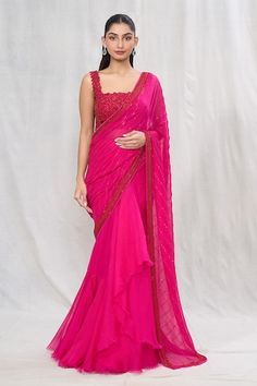 Hot pink saree with sequin, beaded embroidery, ruffled front and hem. Comes with floral embroidered blouse. - Aza Fashions Festive Pre-draped Georgette Saree, Fitted Pre-draped Festive Saree, Designer Pre-draped Saree With Dupatta, Pre-draped Fitted Saree With Dupatta, Fitted Pre-draped Saree For Festive Occasions, Festive Pre-draped Saree With Dupatta, Hot Pink Saree, Ruffle Sarees, Sequin Saree