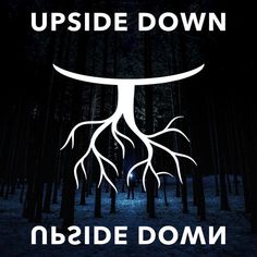 upside down in the woods with roots growing out of it's sides and words above them that read upside down