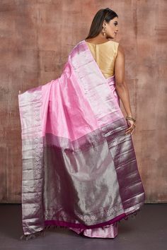 Stunning light pink Kanjeevaram silk sari is a perfect drape for festivals and weddings! The saree is enhanced with silver zari maroon border and pallu. It comes with a matching blouse piece. Shop silk sarees in USA from Pure Elegance. Disclaimer: The shown stitched blouse on the model is for display purpose only. The saree comes with a matching blouse piece and finished with fall and piko. Pink Handloom Pre-draped Saree In Tissue Silk, Pink Tissue Silk Handloom Pre-draped Saree, Pink Tissue Silk Pre-draped Saree Handloom, Silver Anarkali Saree In Traditional Drape, Anarkali Silver Saree With Traditional Drape, Pink Pre-draped Saree With Zari Weaving In Tissue Silk, Pink Tussar Silk Traditional Wear With Border, Festive Pink Saree With Border Details, Pink Art Silk Traditional Wear With Border