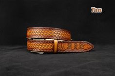 "Basket Weaving Tooled Leather Belt, Hand crafted Mens Women leather belt If you did not specify the initials font when ordering, then by default we make font # 3 It's 100 % Handmade The belt is made of vegetable tanned leather. Belt sewn on length, leather is dyed by hand. Edges of each the belt are smoothed and treated with high quality special paint. The surface and edges of the belt are treated with a special finish coat. This belt is made by hand, which gives it a personality. Each subseque Custom Engraved Brown Belts, Custom Brown Engraved Belts, Personalized Basket, Handmade Leather Belts, Initial Fonts, Belt Western, Custom Leather Belts, Mens Western, Handmade Leather Belt