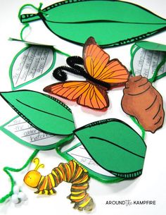 the butterfly and caterpillars are cut out from paper