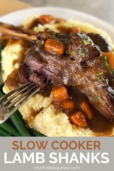 Lamb shank sitting on mashed potato on a white plate with green beans and a fork. Lamb Shanks Oven, Lamb Shanks Recipe, Lamb Shanks Slow Cooker, Shanks Recipe, Slow Cooked Lamb Shanks, Lamb Shank Recipe, Braised Lamb Shanks, Slow Cooker Lamb, Lamb Shank