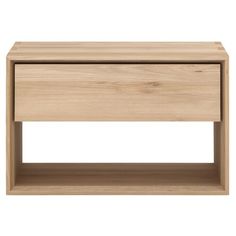 the side table is made from wood and has an open drawer on one side, with two