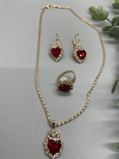 Gold Jewelry Red Dress, Red Quince Jewelry, Crystal Jewelry Sets For Anniversary On Valentine's Day, Crystal Jewelry Sets For Anniversary And Valentine's Day, Valentine's Day Crystal Jewelry Sets Gift, Heart-shaped Jewelry Set For Valentine's Day Party, Heart Shaped Alloy Jewelry For Anniversary, Red Alloy Jewelry As A Gift, Heart-shaped Alloy Jewelry For Anniversary