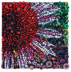 an art piece made out of buttons and beads