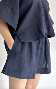 An effortless top deep v in washed linen.    100% linen. Linen Tops With Pockets, Effortless Linen Tops With Pockets, Summer Linen Tops In Indigo, Summer Indigo Linen Tops, Indigo Linen Summer Tops, Relaxed Blue Linen Tops, Chic Linen V-neck Top, Relaxed Linen V-neck Top, Linen Relaxed-fit Sleep Tops